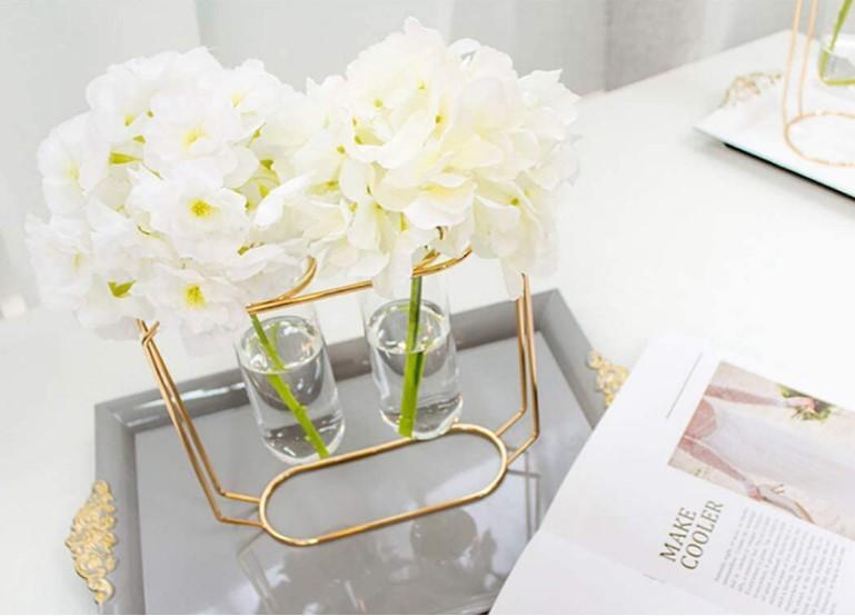 Elegant Golden Metal Frame Glass Vase Stand for Tabletop & Gifting  Best for targeting decor accent buyers and gift shoppers.
