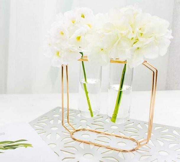 Elegant Golden Metal Frame Glass Vase Stand for Tabletop & Gifting  Best for targeting decor accent buyers and gift shoppers.